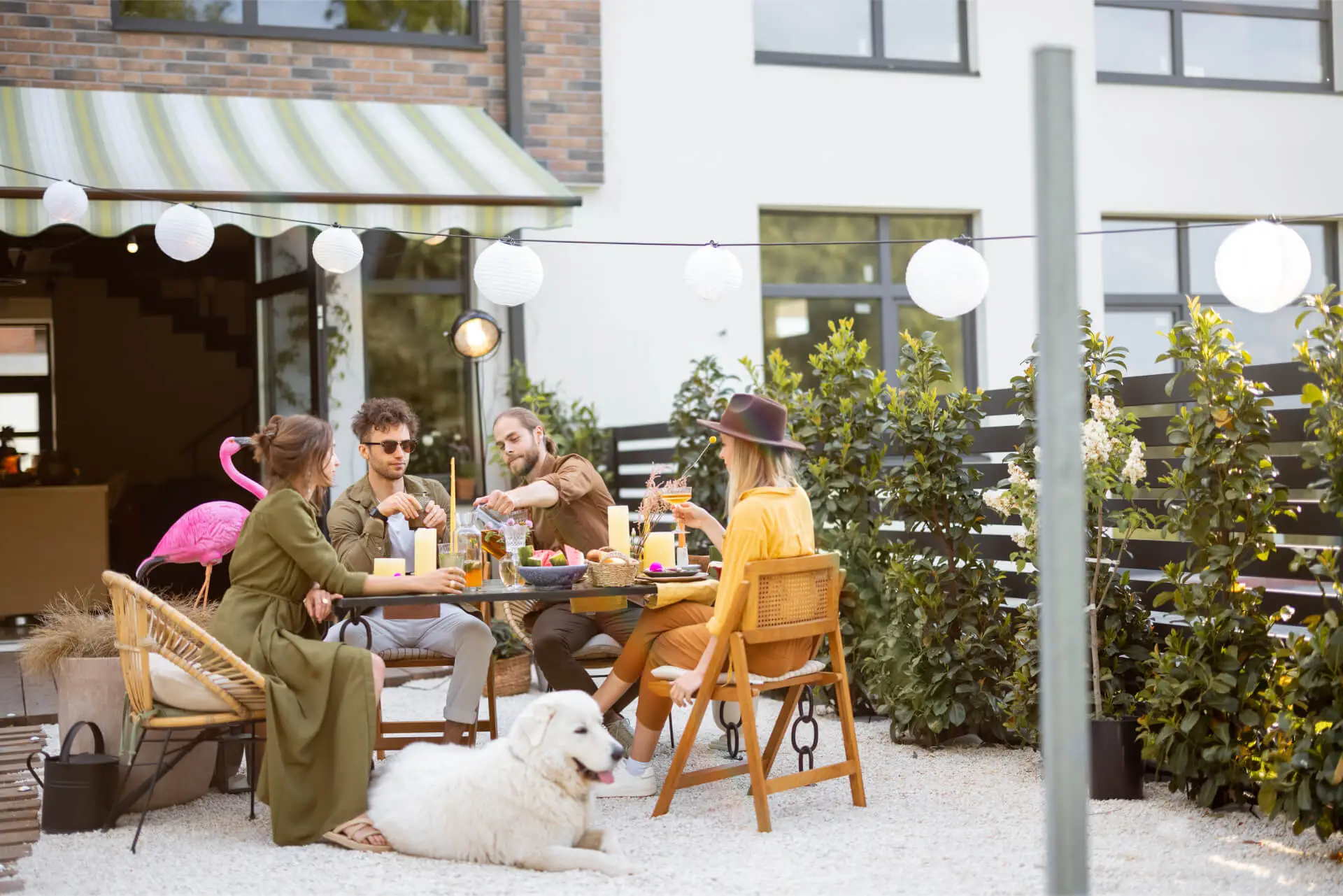 young-friends-dining-at-backyard-of-the-country-ho-2023-11-27-05-23-34-utc 1