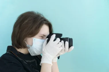 photographer in mask