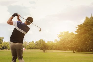man golfing